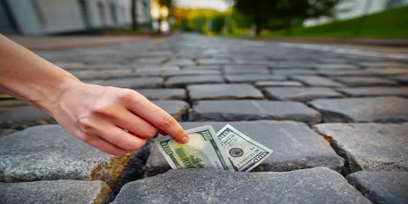 Khám phá con số tài lộc khi ngủ mơ nhặt được tiền